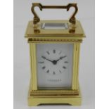 Garrard, London. A brass cased carriage clock. H.11cm