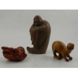 A Japanese wooden netsuke, modelled as two rats in basket,