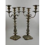 A late 19th century pair of three light two branch table candelabras. H.