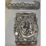A white metal inkwell,cast in relief with dragons and a phoenix, with a character mark to base, w.