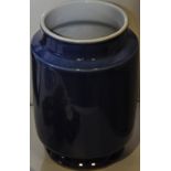 A Chinese blue glaze brush pot, of cylindrical form with a narrow lip and circular base, H 23cm.