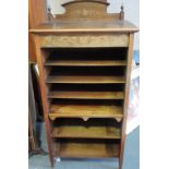 An Edwardian rosewood music cabinet,