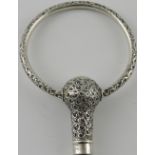 An early 20th century silver parasol handle, marks indistinct,