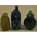 Three assorted Chinese snuff bottles including one carved in the form of a monkey, (3).