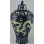 An early 20th century blue and white baluster shaped vase,