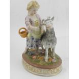 A porcelain figure of a young girl with a goat, bears mark to base.