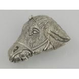 A novelty silver plated vesta case in the form of a horse.