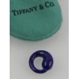 Tiffany & Co, New York. A lapis lazuli 'Eternal Circle' pendant, designed by Elsa Peretti.