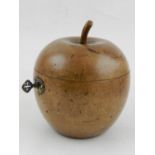 A fruitwood tea caddy in the form of an apple.
