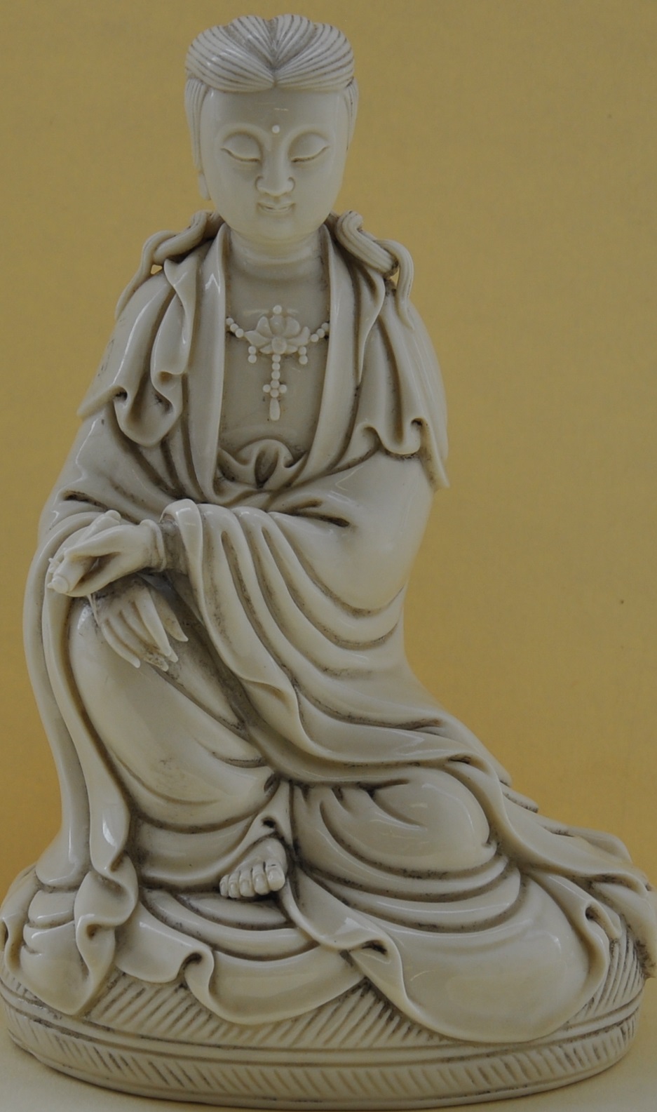 A Chinese blanc de chine figure of guan-yin, H. 19cm.