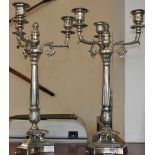 A pair of silverplated Empire style 3 branch candelabra on fluted Acanthus cast columns,