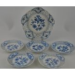 An early 20th century Meissen onion pattern reticulated fruit service,