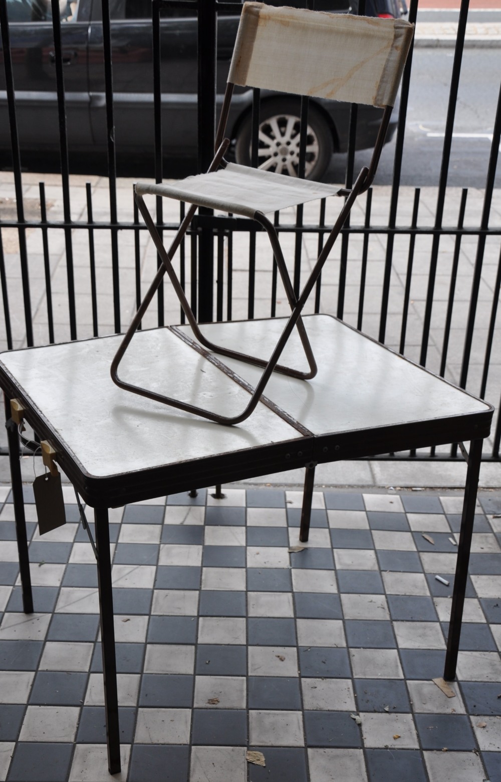 A 1950's Italian Melamine travelling picnic table and stool set.