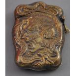 A Victorian style brass vesta embossed with mephistopheles