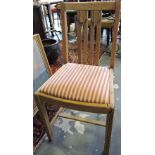 A set of four Art Deco style bleached oak dining chairs