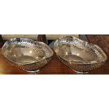 A pair of Victorian style plated bread baskets of pierced oval form with beaded rims