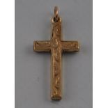 An engraved yellow metal crucifix pendant, L.