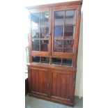 An Edwardian walnut bookcase cabinet,