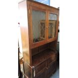 A mid 20th century oak bookcase cabinet,