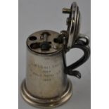 A 1950s silver plated Dunhill tankard or Bumper table lighter,