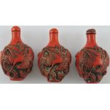 A cinnamon lacquer snuff bottle, the incised decoration of a dragon chasing a flaming pearl, H.