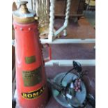 A Romac fire extinguisher, floor standing of red conical form, dated 1969,
