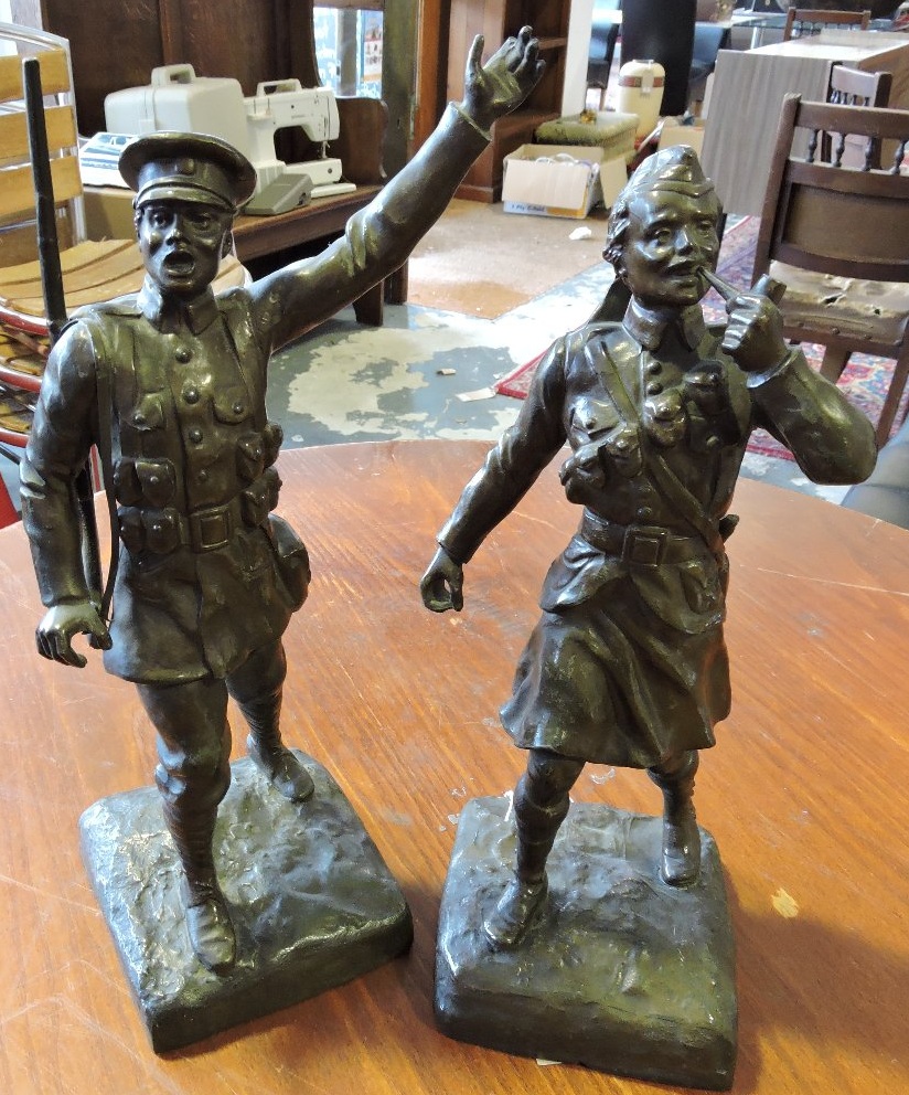 After F Kinsburger, an early 20th century spelter figure of happy Highland soldier, smoking a pipe,