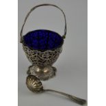 A George III style silver sugar basket, London 1925 by Mappin & Webb,