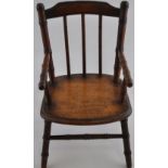 A late 19th century doll's open armchair, with spindle back and faux bamboo supports, arms and legs,