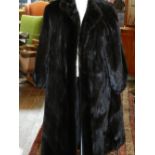 Chrisian Dior, Paris. ladies brown mink fur coat, size approx. 12.