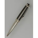 A Mont Blanc silver solitaire ball point pen.