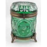 A Bohemian style hinged green glass and ormolu mounted jar and cover, decorated with stars and