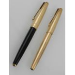 A cased set of two parker fountain pens, 12CT gold.