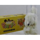 A Pelham puppet of a poodle, box.