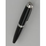 A Caran D'Ache pall point pen.