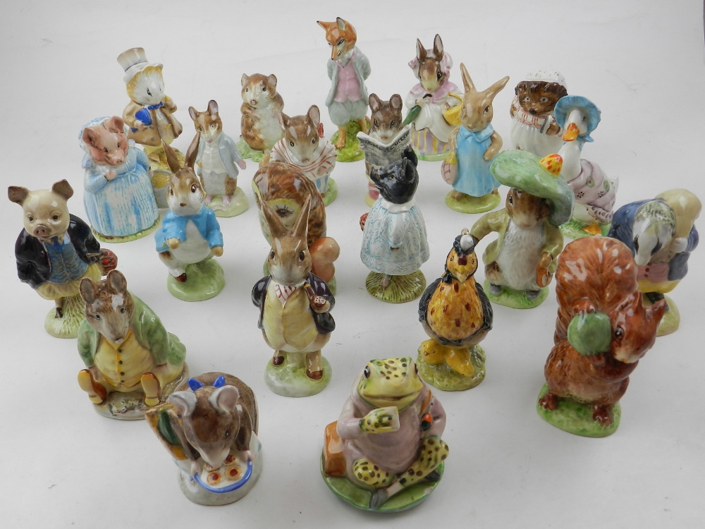 A selection of Beswick Beartix pottery figurines,