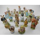 A selection of Beswick Beartix pottery figurines,