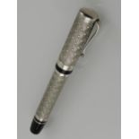 A Montegrappa silver Cosmopolitan African ballpoint pen.