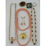 A quantity of costume jewellery, to include a coral beaded necklace, a pair of coral earrings,