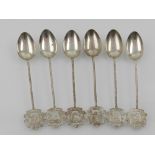 Six mid 20th century Malaysian silver plated tea spoons, with twisted stems,