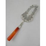 A Victorian silver fish slice, engraved decorated with vine leaves and grapes,