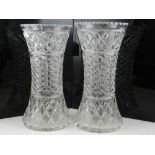 A pair of cut glass vases.