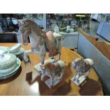 Three Tang style polychrome glazed pottery horses,