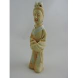 A Chinese celadon figure, H.