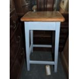 A Victorian pine clerk's stool with later painted blue base