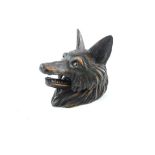 A carved Blackforest style inkwell in the form of a fox head, H. 8cm.