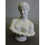 A parian style bust of an elegant young woman, raised on a socal base, H. 34cm.