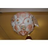 A 1950s peach and clear glass ceiling shade chain hung printed with floral panels.