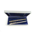 A Christian Dior fountain pen, with a ribbed body marked 925,