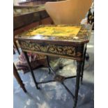 An early Victorian ebonised, penwork worktable,